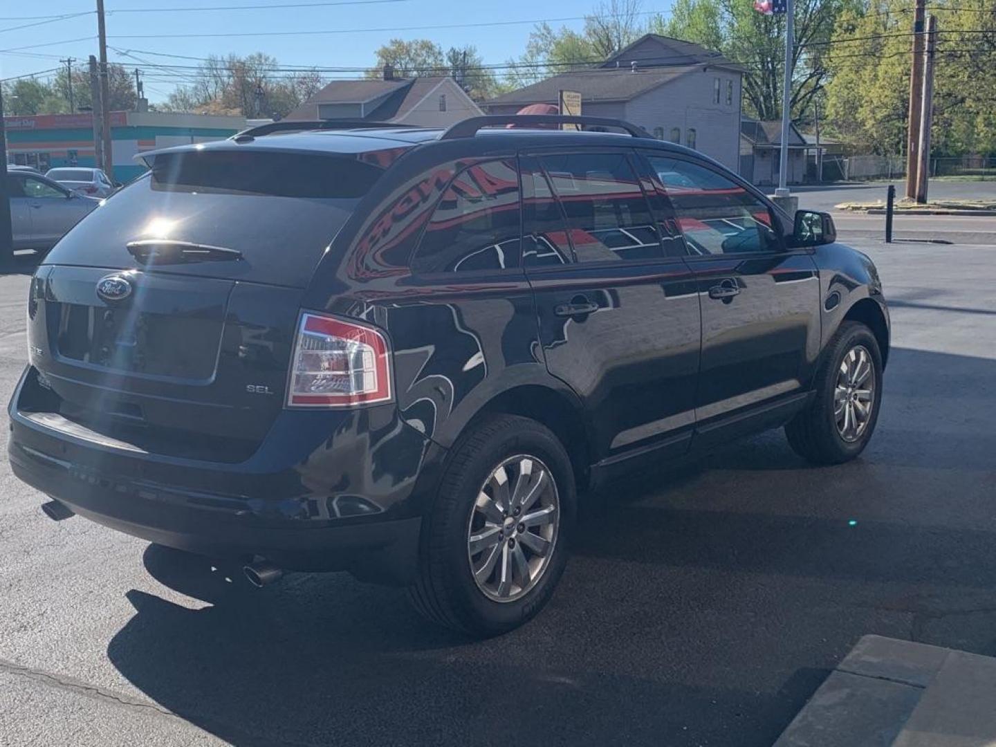 2010 BLACK FORD EDGE SEL (2FMDK3JC6AB) with an 3.5L engine, Automatic transmission, located at 3100 Covert Avenue, Evansville, IN, 47714, (812) 473-4492, 37.955418, -87.512238 - Photo#3