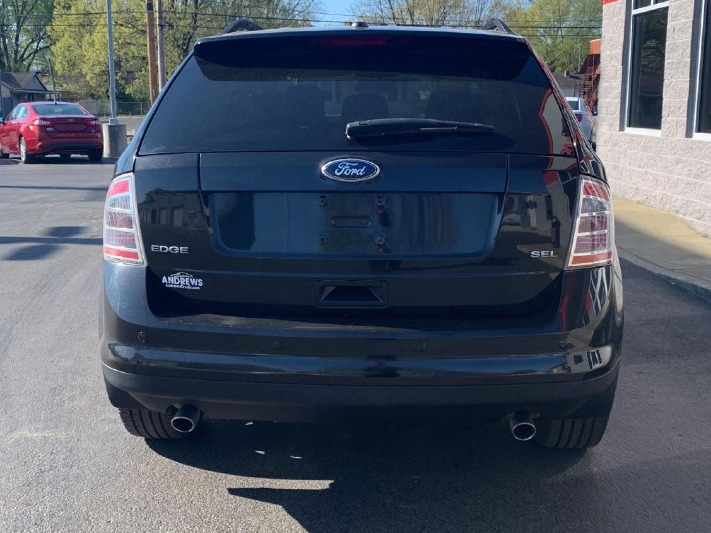 2010 BLACK FORD EDGE SEL (2FMDK3JC6AB) with an 3.5L engine, Automatic transmission, located at 3100 Covert Avenue, Evansville, IN, 47714, (812) 473-4492, 37.955418, -87.512238 - Photo#4