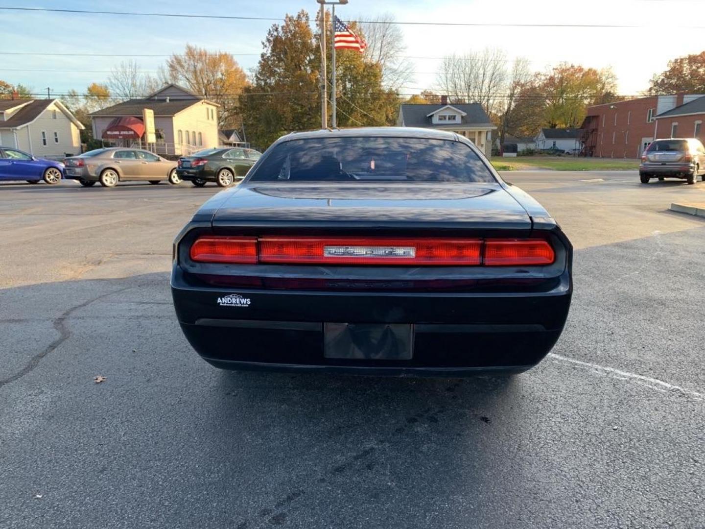 2010 BLACK DODGE CHALLENGER SE (2B3CJ4DV3AH) with an 3.5L engine, Automatic transmission, located at 3100 Covert Avenue, Evansville, IN, 47714, (812) 473-4492, 37.955418, -87.512238 - Photo#3