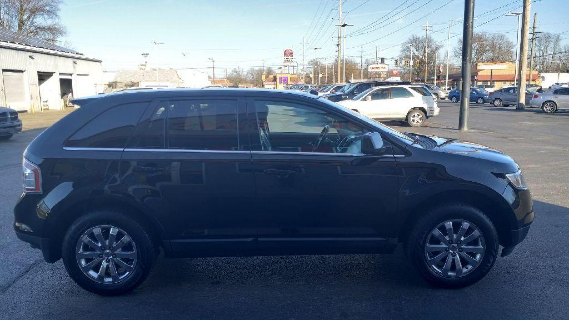 2009 BLACK FORD EDGE LIMITED (2FMDK49C49B) with an 3.5L engine, Automatic transmission, located at 3100 Covert Avenue, Evansville, IN, 47714, (812) 473-4492, 37.955418, -87.512238 - Photo#2