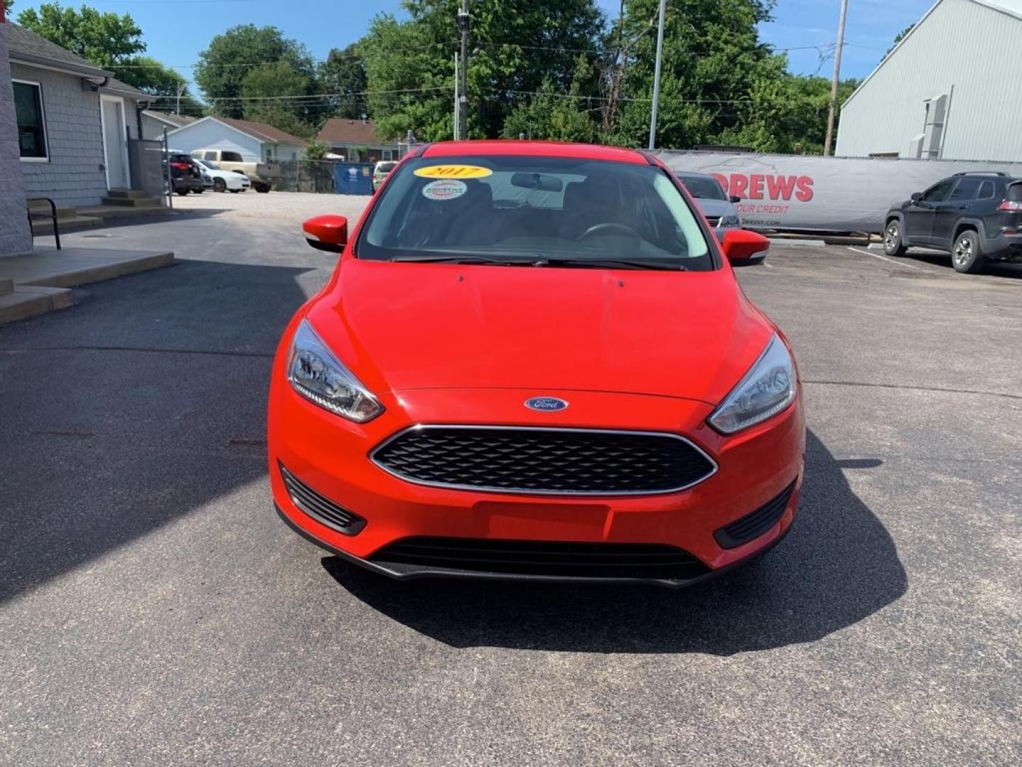 2017 RED FORD FOCUS SE (1FADP3K28HL) with an 2.0L engine, Automatic transmission, located at 3100 Covert Avenue, Evansville, IN, 47714, (812) 473-4492, 37.955418, -87.512238 - Photo#1