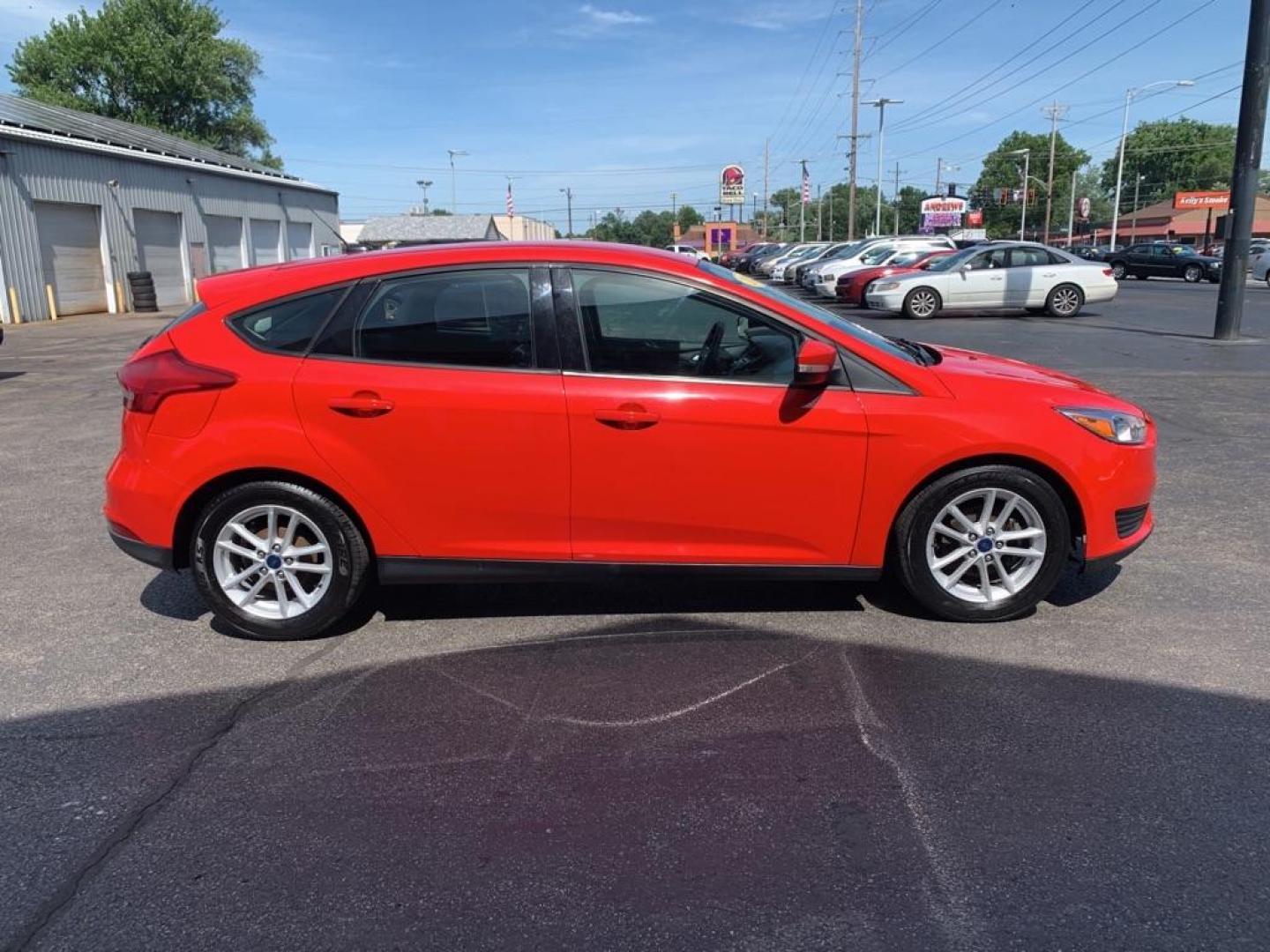 2017 RED FORD FOCUS SE (1FADP3K28HL) with an 2.0L engine, Automatic transmission, located at 3100 Covert Avenue, Evansville, IN, 47714, (812) 473-4492, 37.955418, -87.512238 - Photo#2