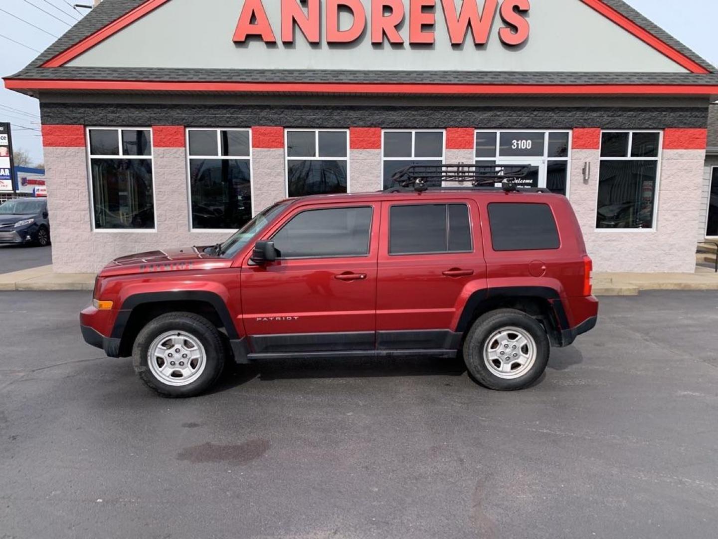 2015 RED JEEP PATRIOT SPORT (1C4NJRBB8FD) with an 2.4L engine, Continuously Variable transmission, located at 3100 Covert Avenue, Evansville, IN, 47714, (812) 473-4492, 37.955418, -87.512238 - Photo#0