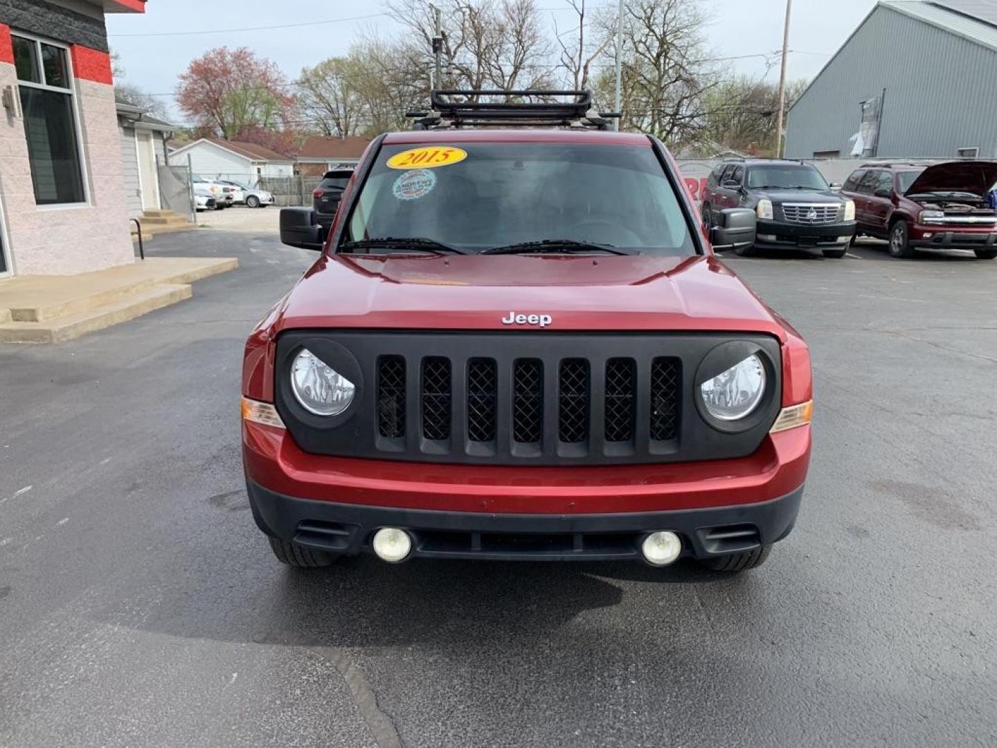 2015 RED JEEP PATRIOT SPORT (1C4NJRBB8FD) with an 2.4L engine, Continuously Variable transmission, located at 3100 Covert Avenue, Evansville, IN, 47714, (812) 473-4492, 37.955418, -87.512238 - Photo#1