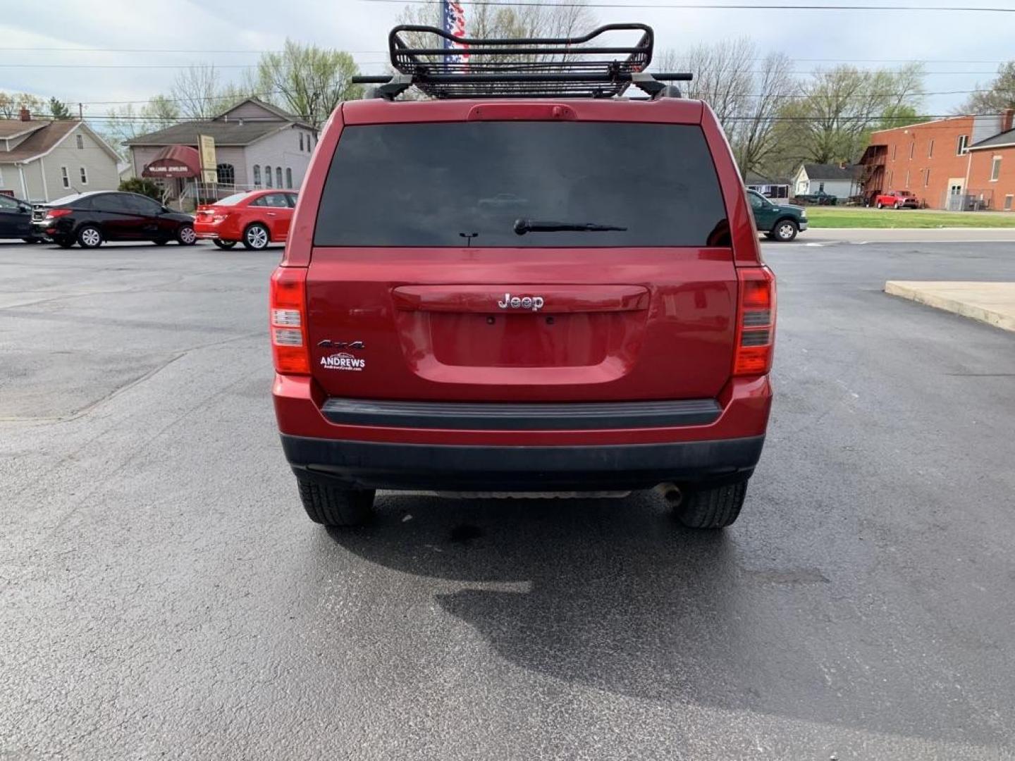 2015 RED JEEP PATRIOT SPORT (1C4NJRBB8FD) with an 2.4L engine, Continuously Variable transmission, located at 3100 Covert Avenue, Evansville, IN, 47714, (812) 473-4492, 37.955418, -87.512238 - Photo#3