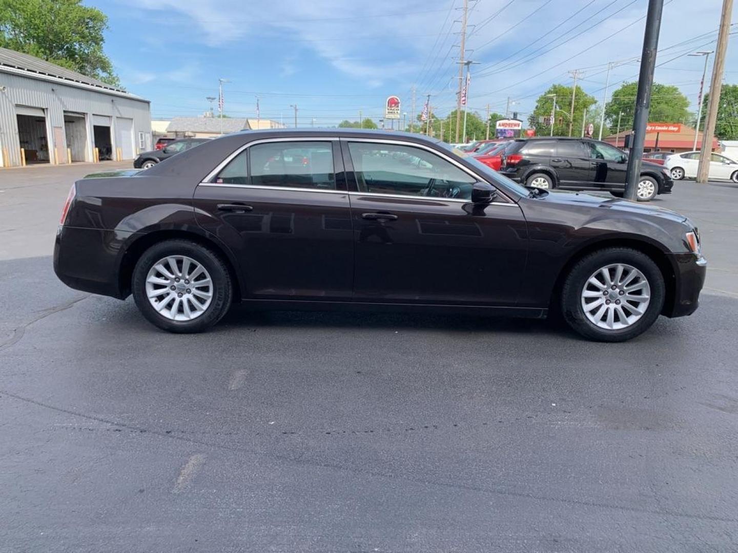 2012 GRAY CHRYSLER 300 (2C3CCAAG0CH) with an 3.6L engine, Automatic transmission, located at 3100 Covert Avenue, Evansville, IN, 47714, (812) 473-4492, 37.955418, -87.512238 - Photo#2