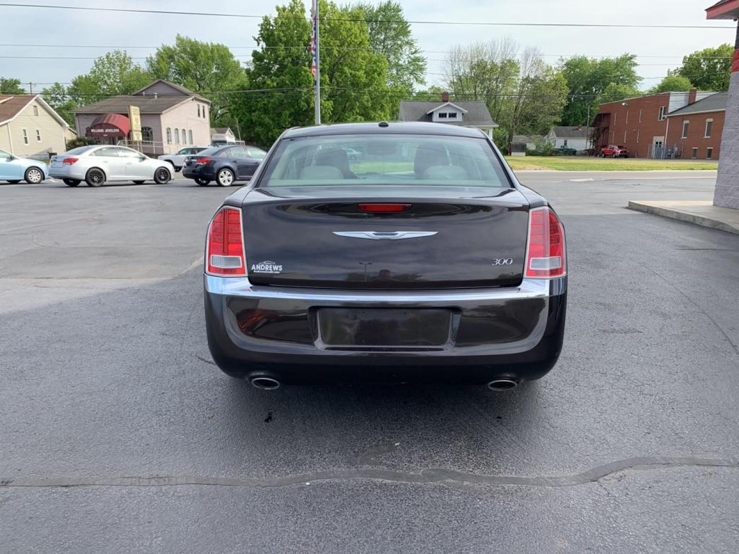 2012 GRAY CHRYSLER 300 (2C3CCAAG0CH) with an 3.6L engine, Automatic transmission, located at 3100 Covert Avenue, Evansville, IN, 47714, (812) 473-4492, 37.955418, -87.512238 - Photo#3