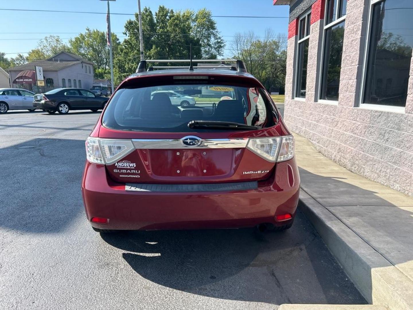 2010 RED SUBARU IMPREZA 2.5I PREMIUM (JF1GH6B62AH) with an 2.5L engine, Automatic transmission, located at 3100 Covert Avenue, Evansville, IN, 47714, (812) 473-4492, 37.955418, -87.512238 - Photo#3