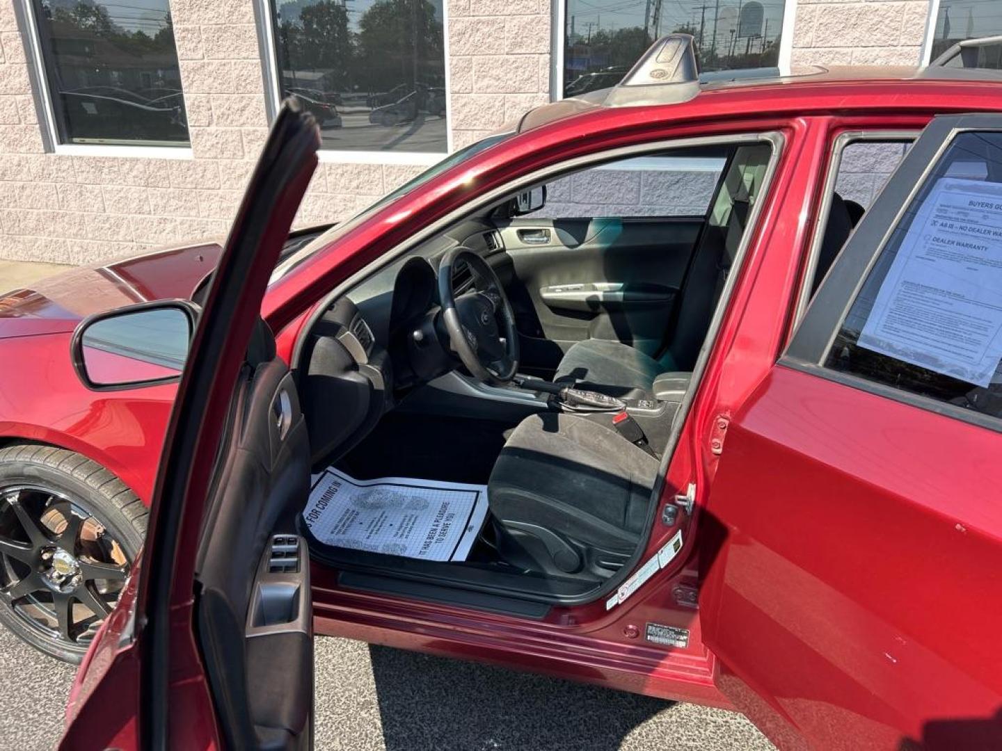 2010 RED SUBARU IMPREZA 2.5I PREMIUM (JF1GH6B62AH) with an 2.5L engine, Automatic transmission, located at 3100 Covert Avenue, Evansville, IN, 47714, (812) 473-4492, 37.955418, -87.512238 - Photo#6