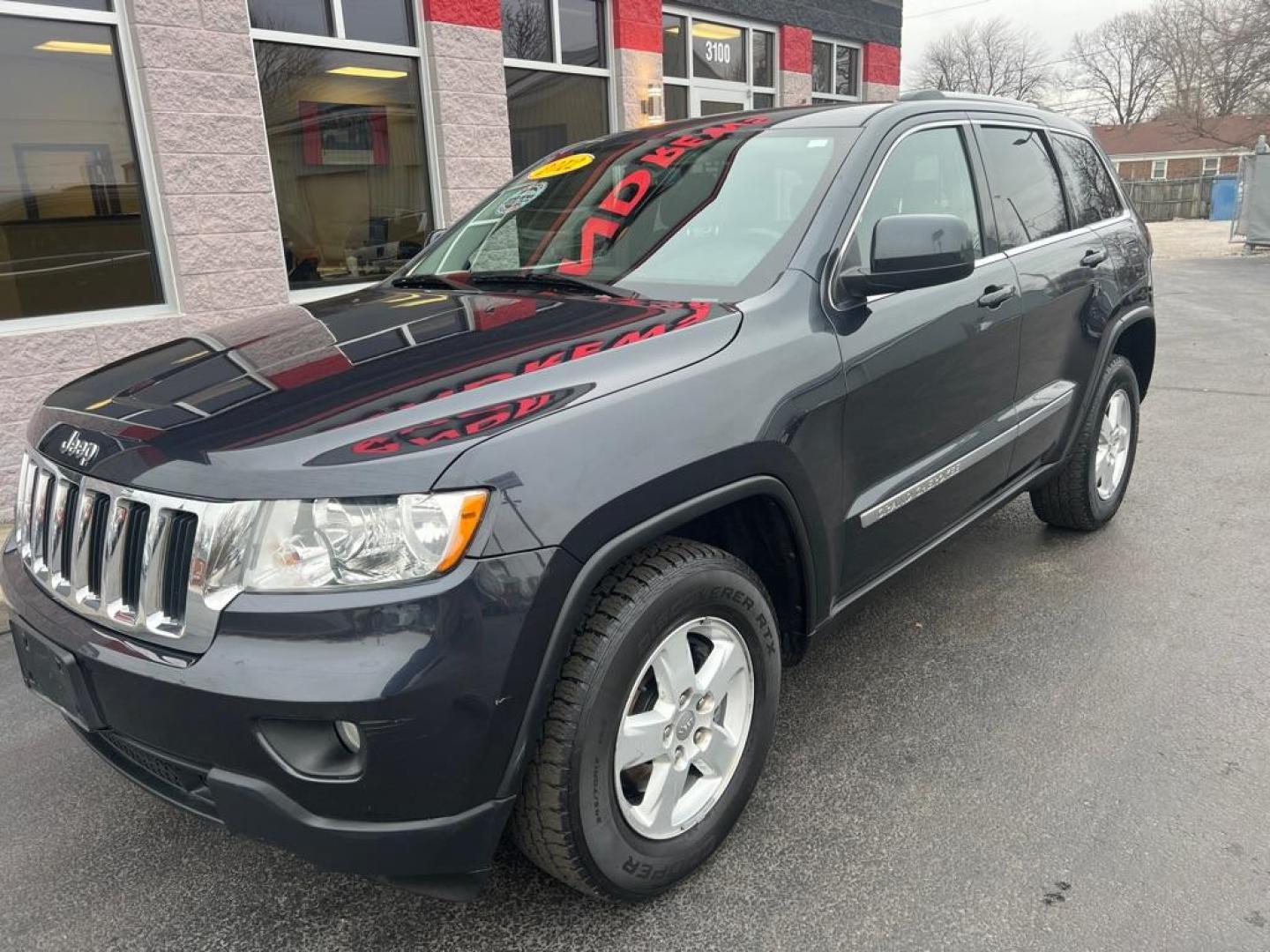 2012 BLUE JEEP GRAND CHEROKEE LAREDO (1C4RJFAG3CC) with an 3.6L engine, Automatic transmission, located at 3100 Covert Avenue, Evansville, IN, 47714, (812) 473-4492, 37.955418, -87.512238 - Photo#2