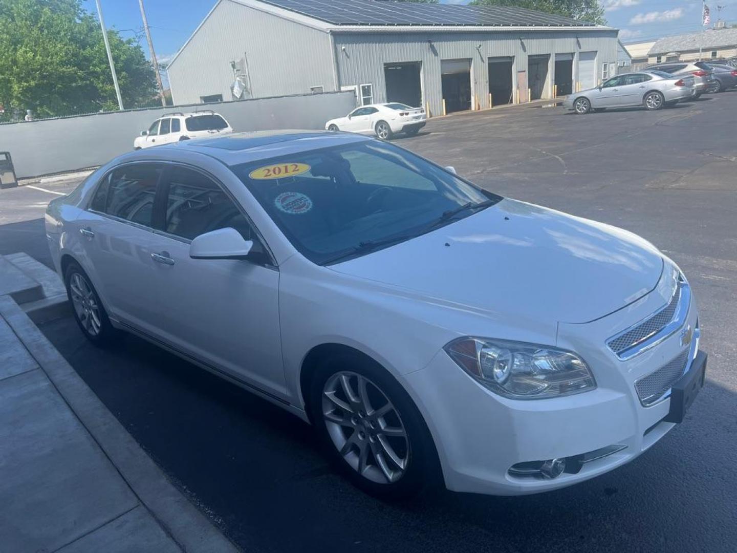 2012 WHITE CHEVROLET MALIBU LTZ (1G1ZG5E74CF) with an 3.6L engine, Automatic transmission, located at 3100 Covert Avenue, Evansville, IN, 47714, (812) 473-4492, 37.955418, -87.512238 - Photo#2