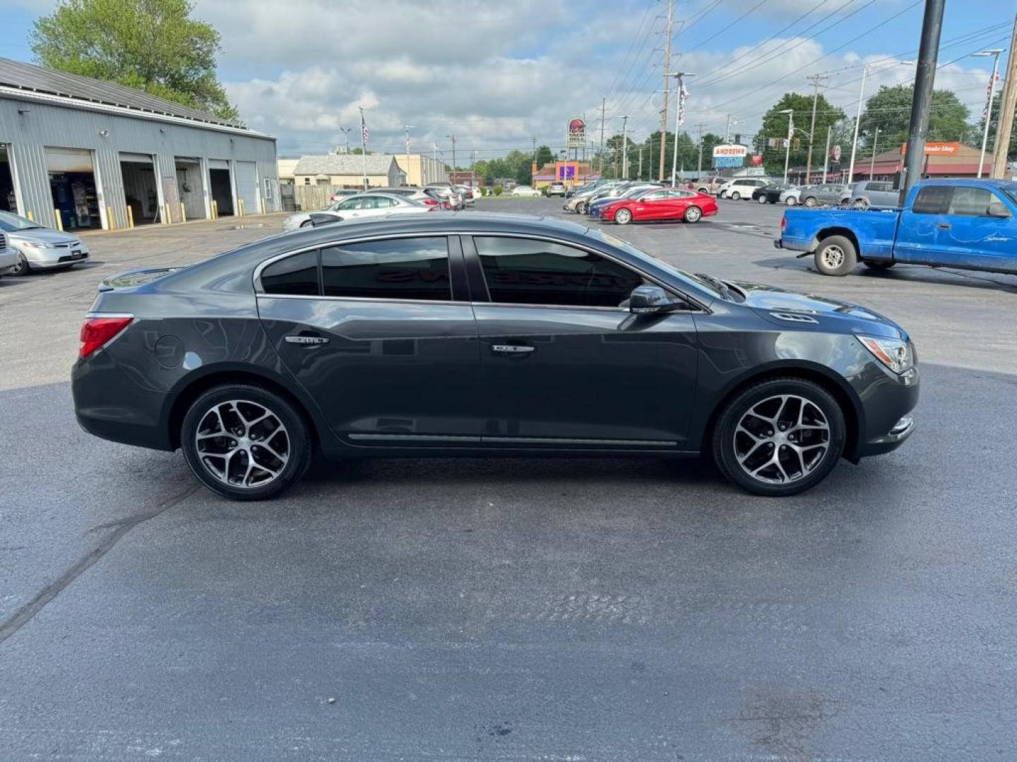 2016 GRAY BUICK LACROSSE SPORT TOURING (1G4G45G32GF) with an 3.6L engine, Automatic transmission, located at 3100 Covert Avenue, Evansville, IN, 47714, (812) 473-4492, 37.955418, -87.512238 - Photo#2