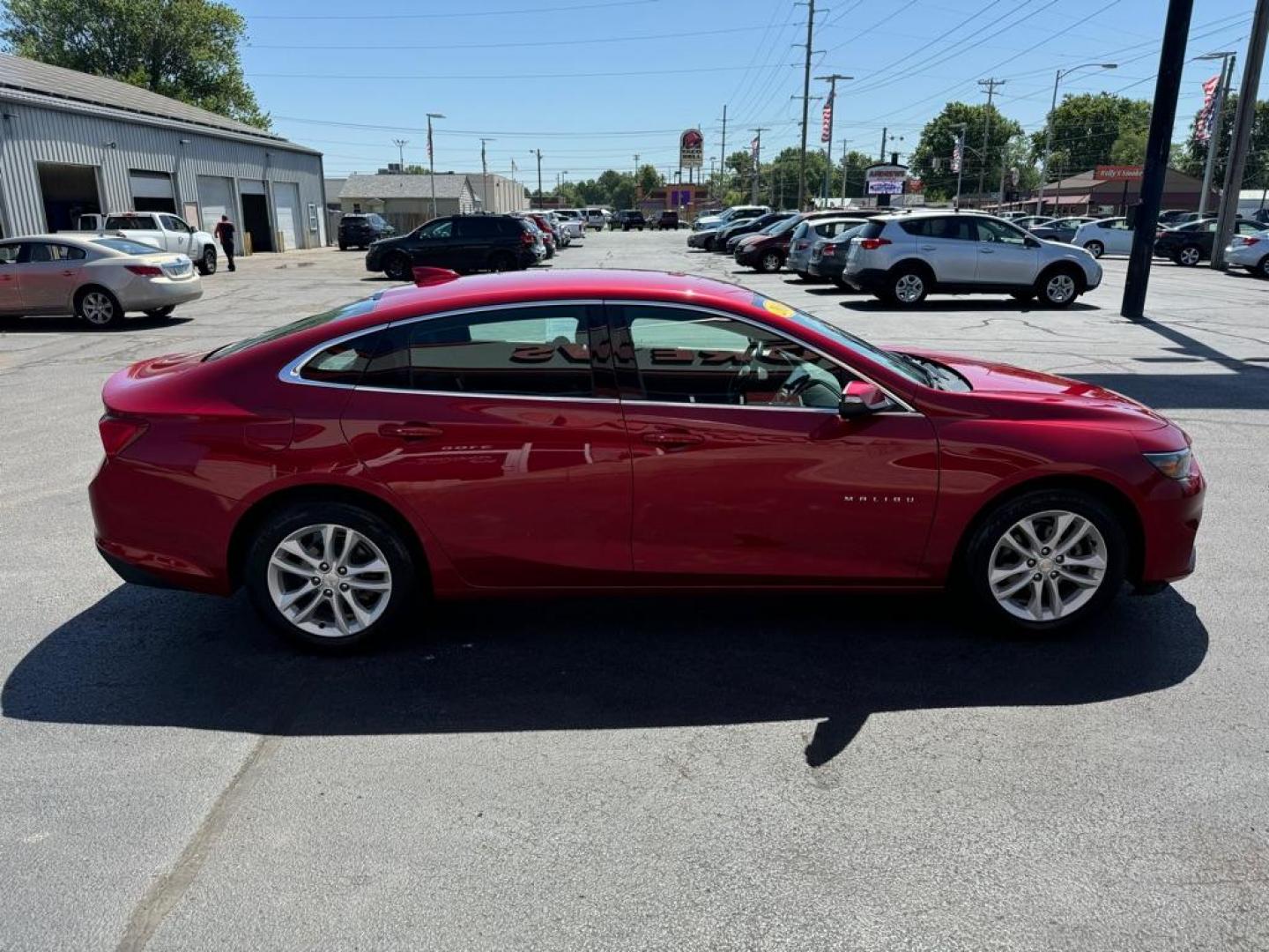 2016 RED CHEVROLET MALIBU LT (1G1ZE5ST7GF) with an 1.5L engine, Automatic transmission, located at 3100 Covert Avenue, Evansville, IN, 47714, (812) 473-4492, 37.955418, -87.512238 - Photo#2