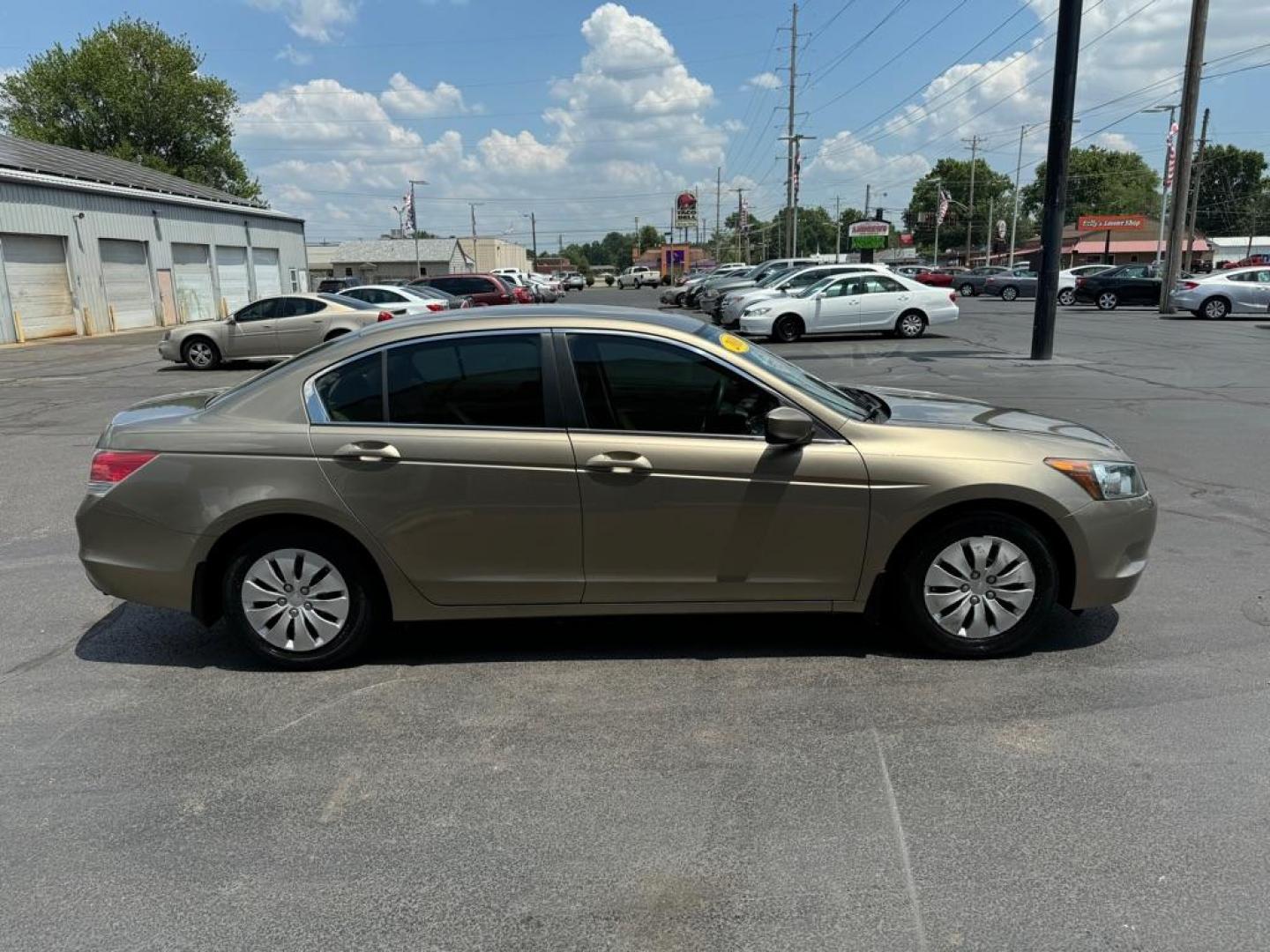 2010 GOLD HONDA ACCORD LX (1HGCP2F39AA) with an 2.4L engine, Automatic transmission, located at 3100 Covert Avenue, Evansville, IN, 47714, (812) 473-4492, 37.955418, -87.512238 - Photo#2