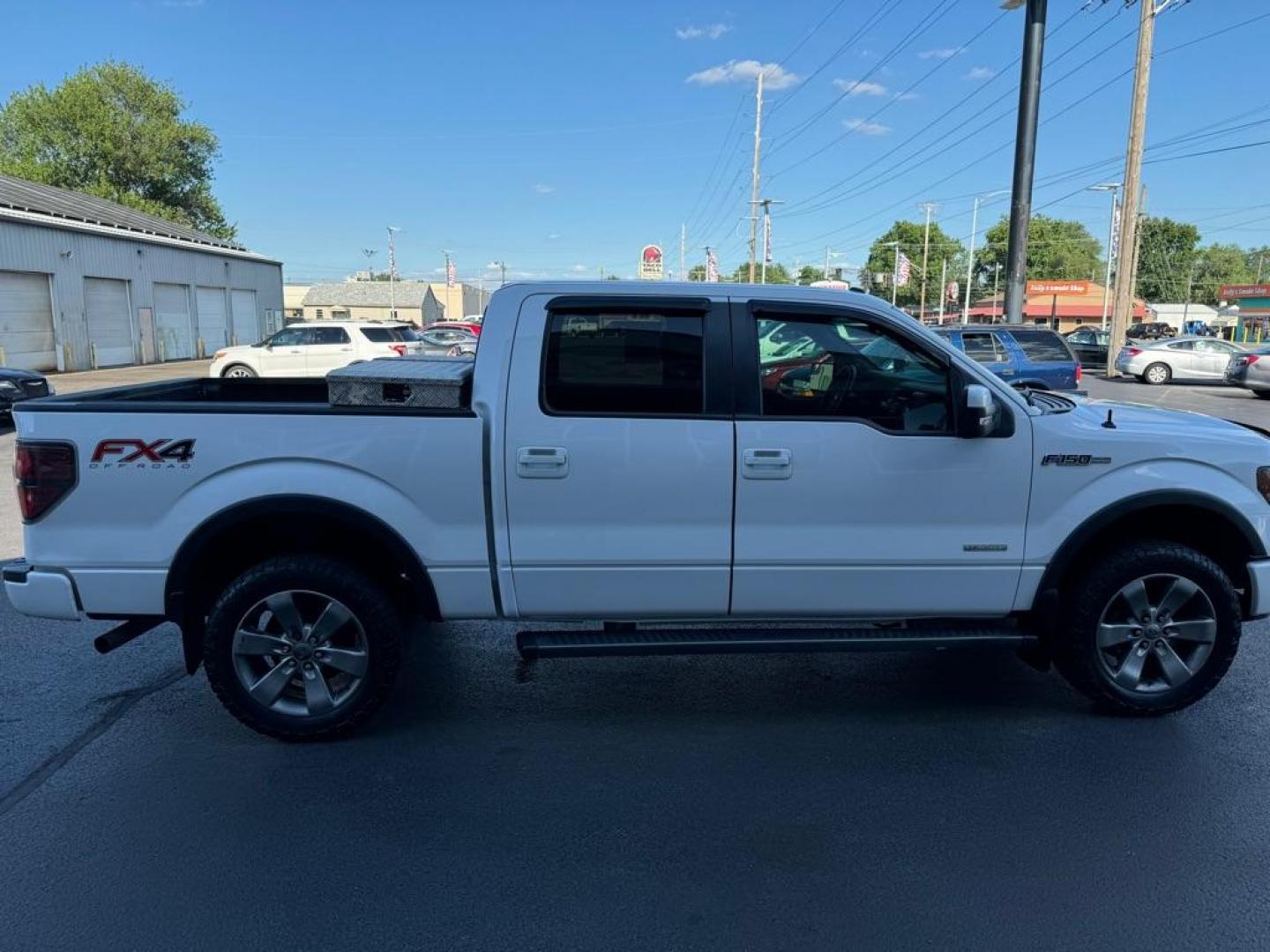 2012 WHITE FORD F150 FX4 (1FTFW1ET5CF) with an 3.5L engine, Automatic transmission, located at 3100 Covert Avenue, Evansville, IN, 47714, (812) 473-4492, 37.955418, -87.512238 - Photo#2