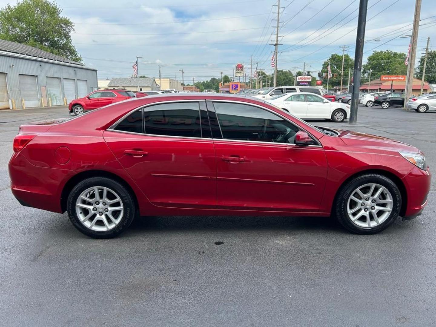 2014 RED CHEVROLET MALIBU 1LT (1G11C5SL4EF) with an 2.5L engine, Automatic transmission, located at 3100 Covert Avenue, Evansville, IN, 47714, (812) 473-4492, 37.955418, -87.512238 - Photo#1