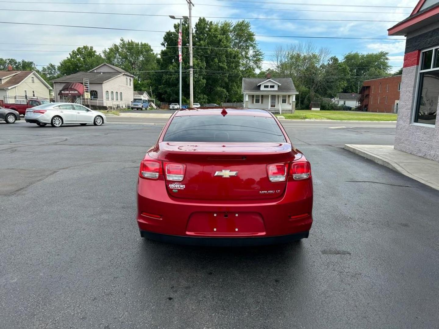 2014 RED CHEVROLET MALIBU 1LT (1G11C5SL4EF) with an 2.5L engine, Automatic transmission, located at 3100 Covert Avenue, Evansville, IN, 47714, (812) 473-4492, 37.955418, -87.512238 - Photo#3