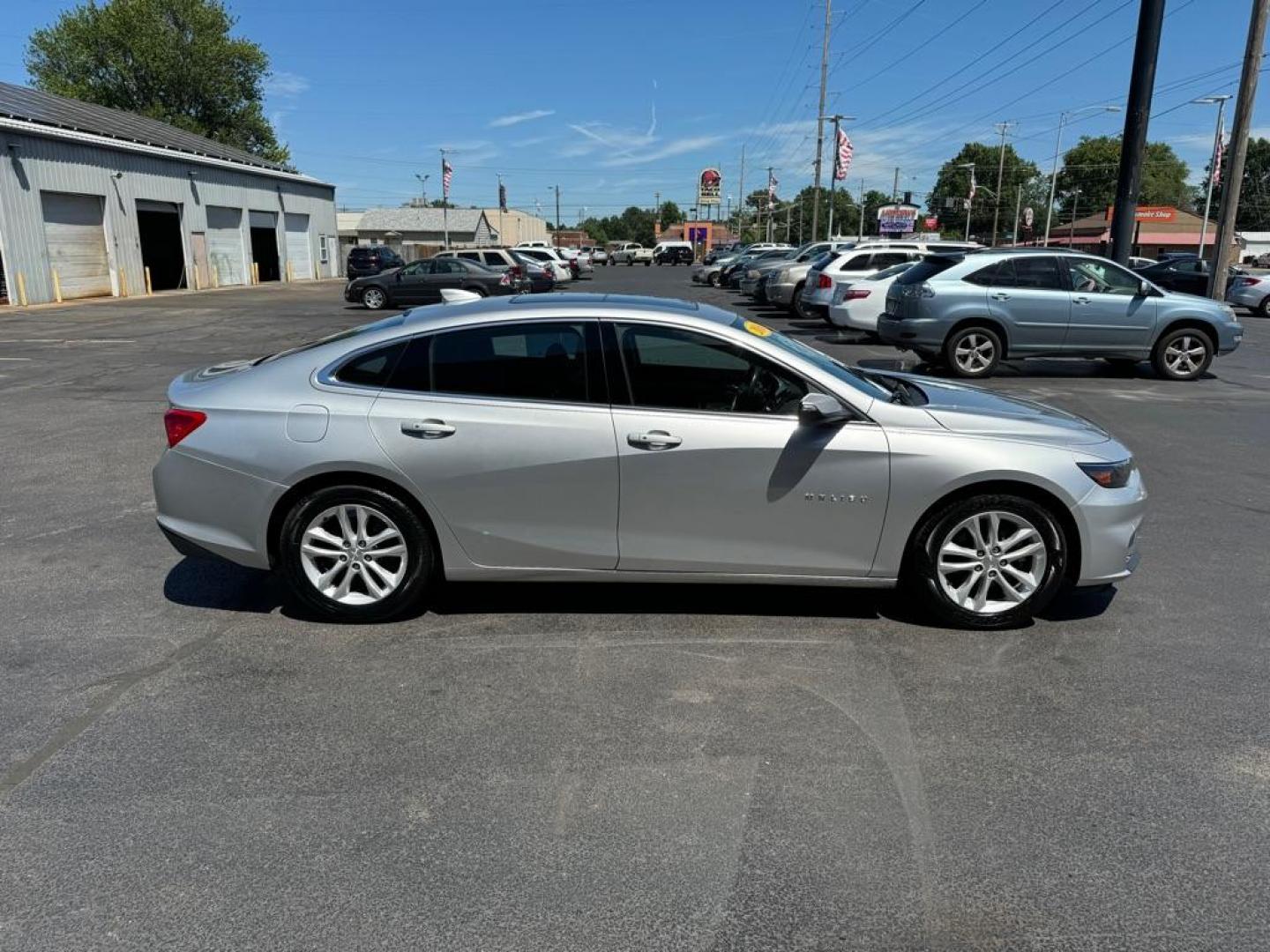 2016 SILVER CHEVROLET MALIBU LT (1G1ZE5ST0GF) with an 1.5L engine, Automatic transmission, located at 3100 Covert Avenue, Evansville, IN, 47714, (812) 473-4492, 37.955418, -87.512238 - Photo#2