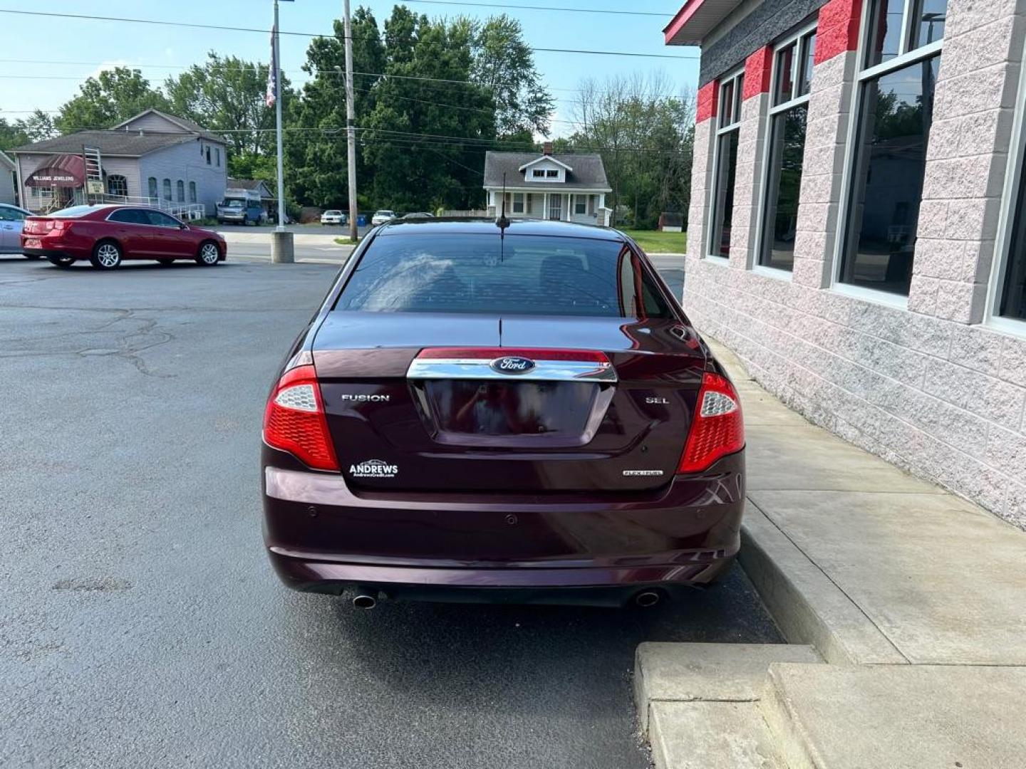 2012 RED FORD FUSION SEL (3FAHP0JG7CR) with an 3.0L engine, Automatic transmission, located at 3100 Covert Avenue, Evansville, IN, 47714, (812) 473-4492, 37.955418, -87.512238 - Photo#3