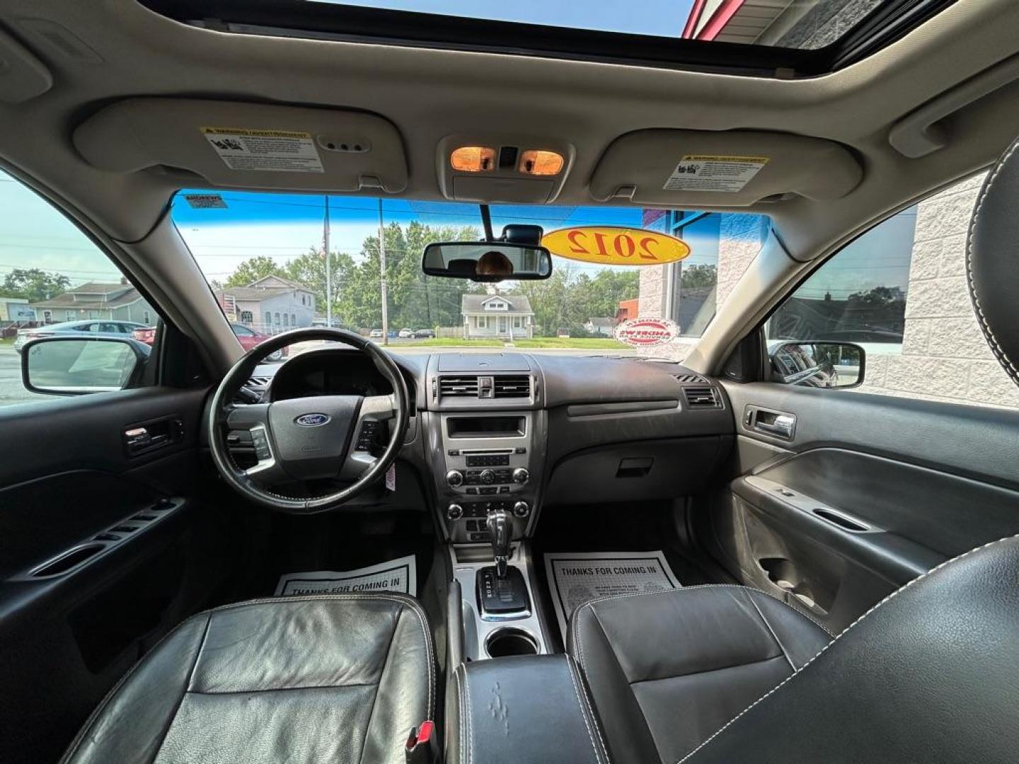 2012 RED FORD FUSION SEL (3FAHP0JG7CR) with an 3.0L engine, Automatic transmission, located at 3100 Covert Avenue, Evansville, IN, 47714, (812) 473-4492, 37.955418, -87.512238 - Photo#4