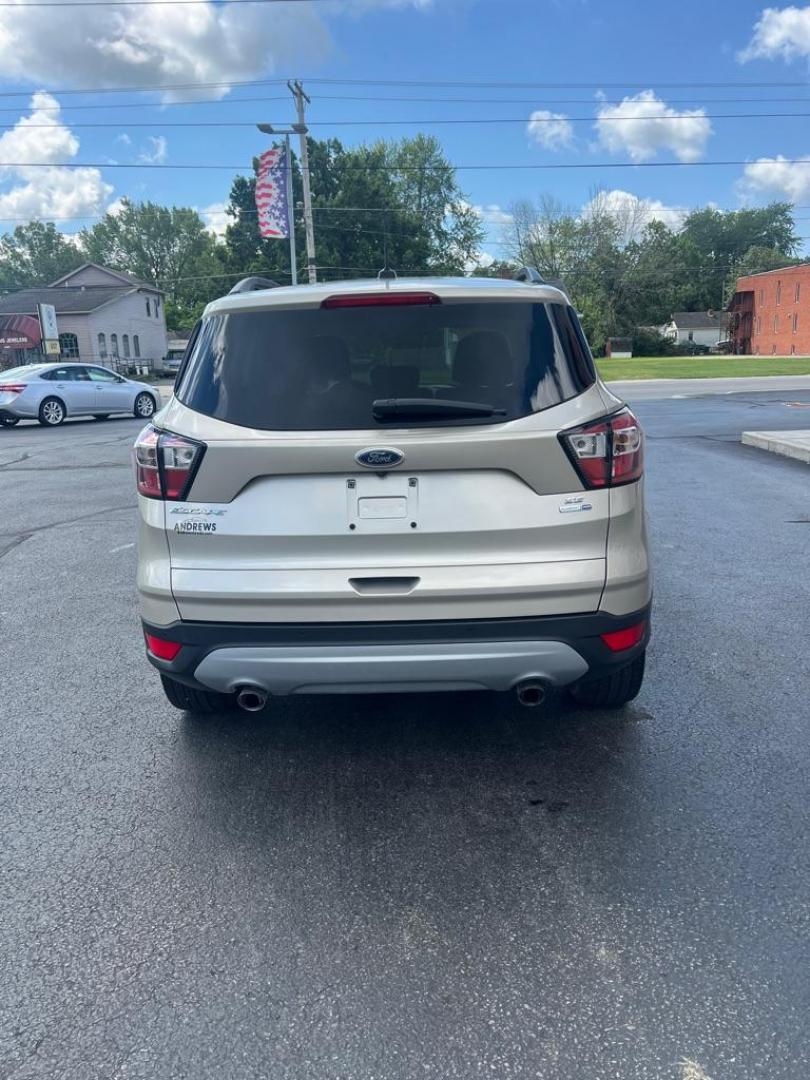 2017 SILVER FORD ESCAPE SE (1FMCU9GD8HU) with an 1.5L engine, Automatic transmission, located at 3100 Covert Avenue, Evansville, IN, 47714, (812) 473-4492, 37.955418, -87.512238 - Photo#3