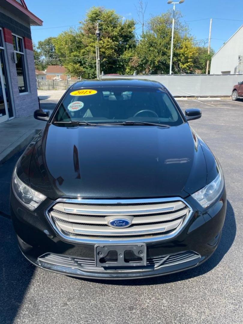 2015 BLACK FORD TAURUS SEL (1FAHP2H81FG) with an 3.5L engine, Automatic transmission, located at 3100 Covert Avenue, Evansville, IN, 47714, (812) 473-4492, 37.955418, -87.512238 - Photo#1