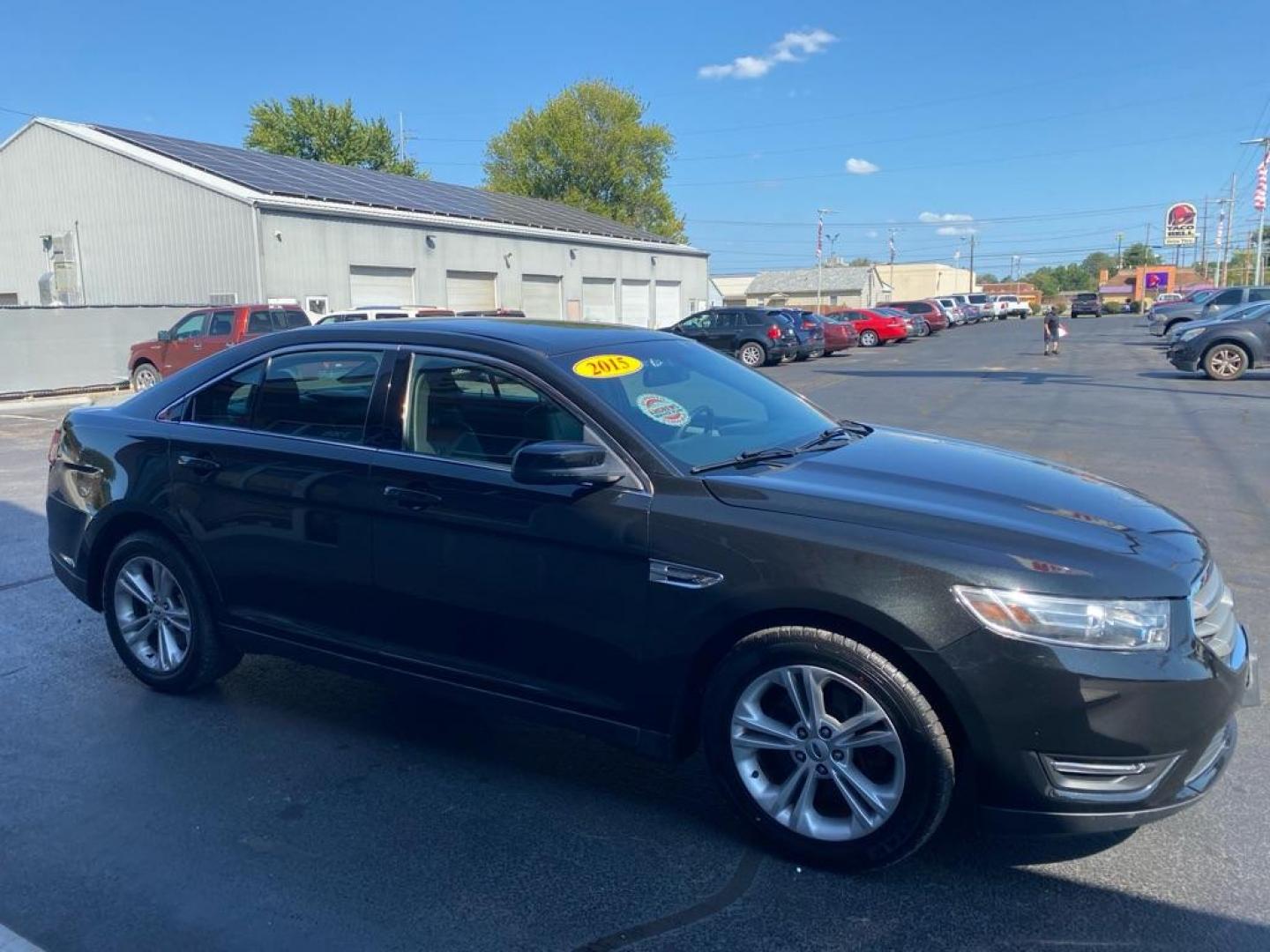 2015 BLACK FORD TAURUS SEL (1FAHP2H81FG) with an 3.5L engine, Automatic transmission, located at 3100 Covert Avenue, Evansville, IN, 47714, (812) 473-4492, 37.955418, -87.512238 - Photo#2