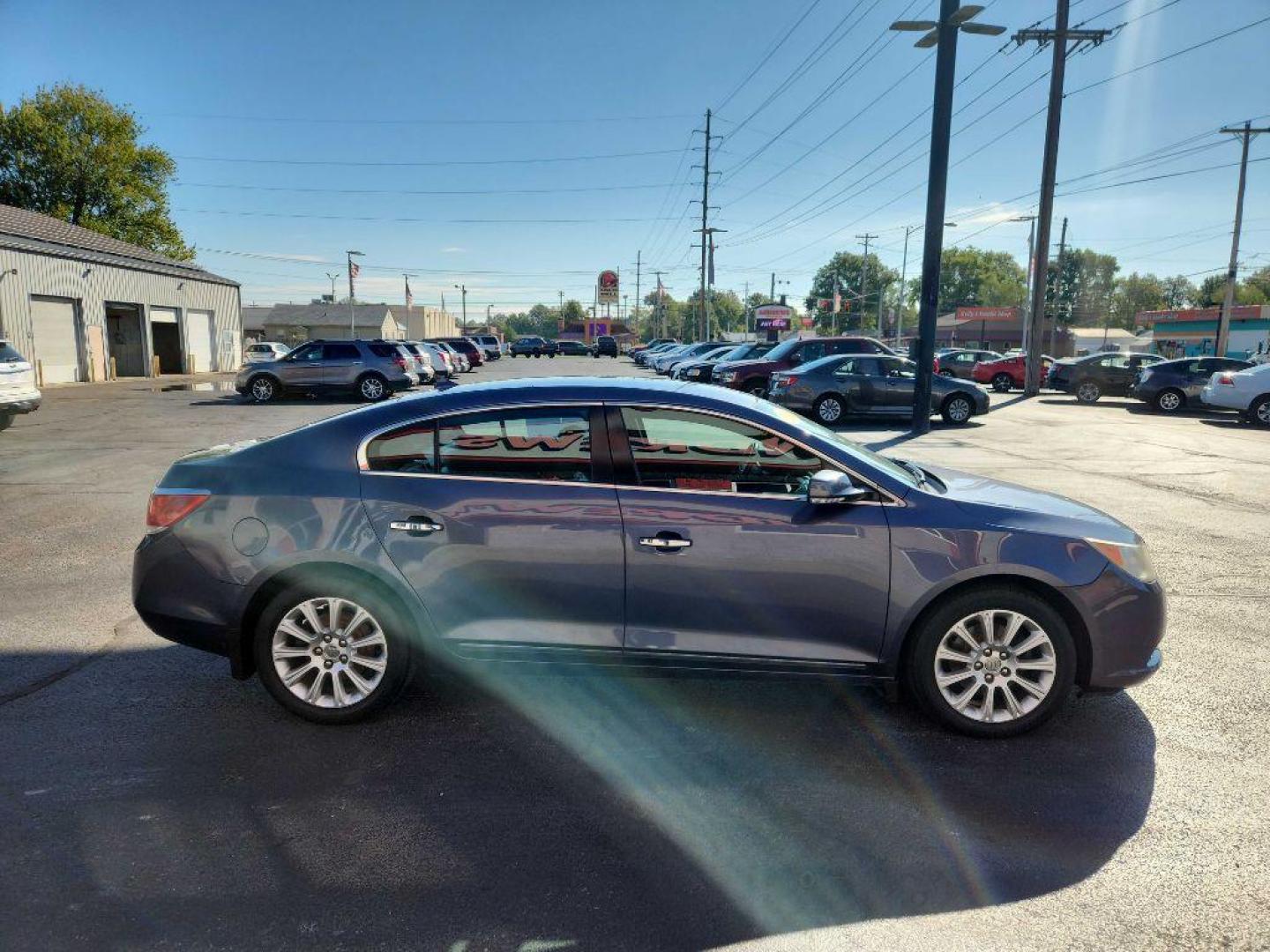 2013 BLUE BUICK LACROSSE (1G4GC5E39DF) with an 3.6L engine, Automatic transmission, located at 3100 Covert Avenue, Evansville, IN, 47714, (812) 473-4492, 37.955418, -87.512238 - Photo#2