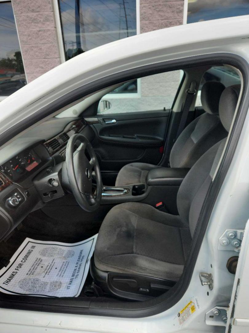 2012 WHITE CHEVROLET IMPALA LS (2G1WF5E31C1) with an 3.6L engine, Automatic transmission, located at 3100 Covert Avenue, Evansville, IN, 47714, (812) 473-4492, 37.955418, -87.512238 - Photo#3