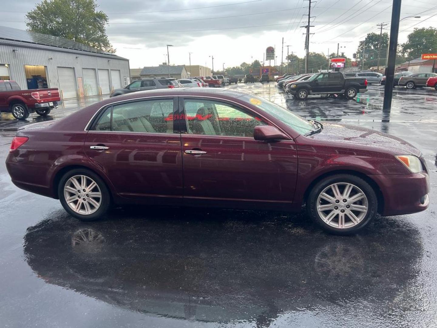 2008 RED TOYOTA AVALON XL (4T1BK36B68U) with an 3.5L engine, Automatic transmission, located at 3100 Covert Avenue, Evansville, IN, 47714, (812) 473-4492, 37.955418, -87.512238 - Photo#2