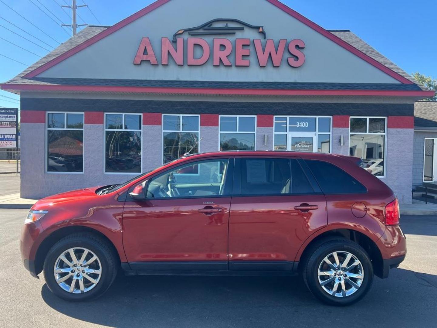 2014 ORANGE FORD EDGE SEL (2FMDK4JC7EB) with an 3.5L engine, Automatic transmission, located at 3100 Covert Avenue, Evansville, IN, 47714, (812) 473-4492, 37.955418, -87.512238 - Photo#0