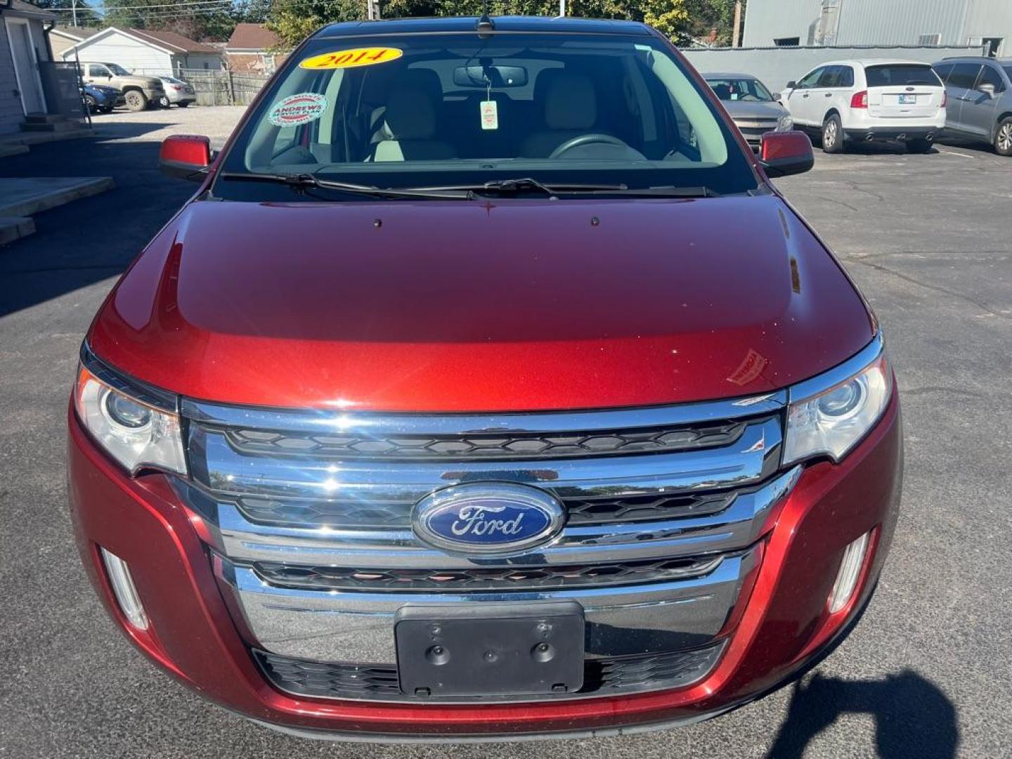 2014 ORANGE FORD EDGE SEL (2FMDK4JC7EB) with an 3.5L engine, Automatic transmission, located at 3100 Covert Avenue, Evansville, IN, 47714, (812) 473-4492, 37.955418, -87.512238 - Photo#1