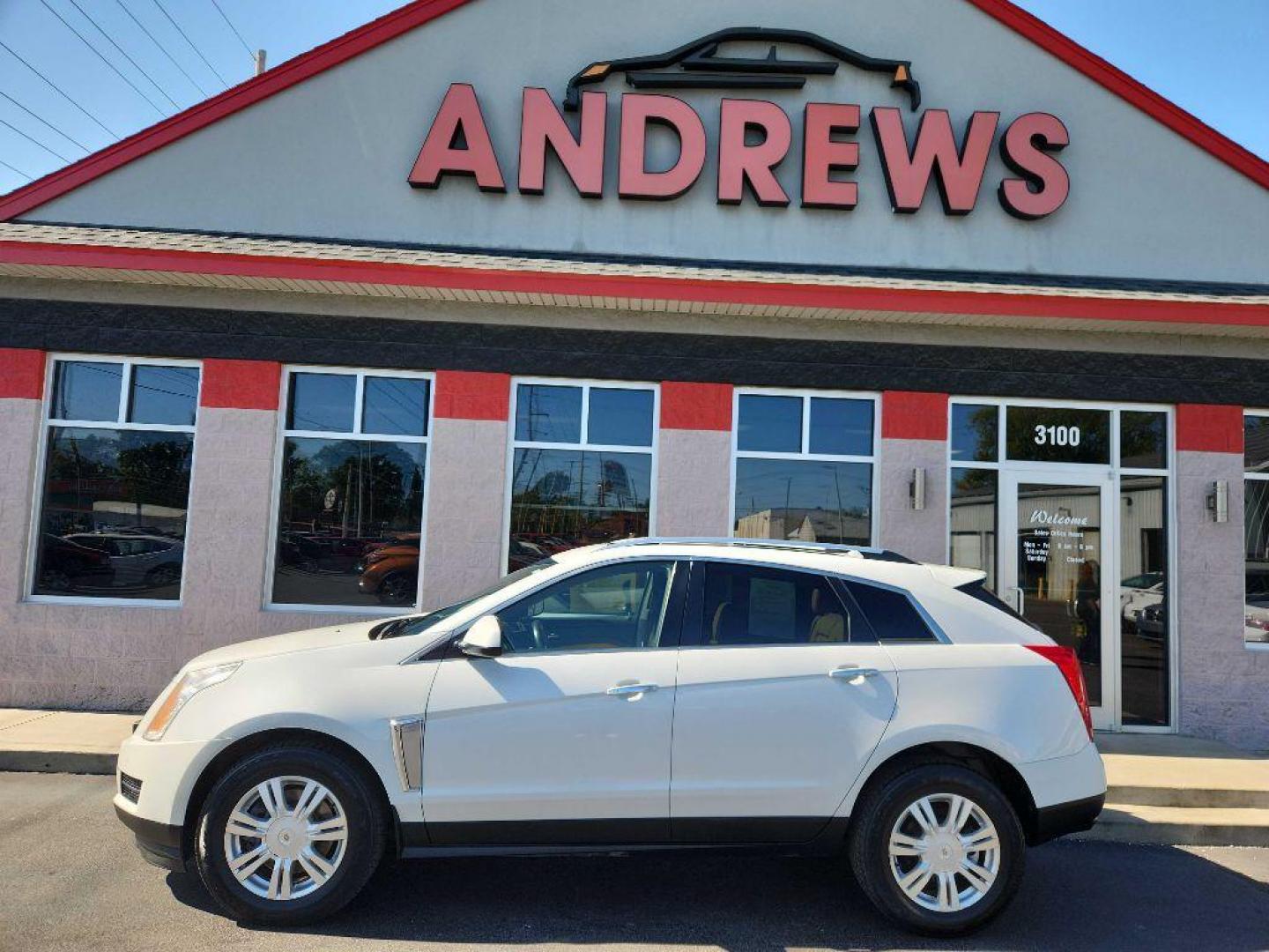 2014 WHITE CADILLAC SRX LUXURY COLLECTION (3GYFNBE32ES) with an 3.6L engine, Automatic transmission, located at 3100 Covert Avenue, Evansville, IN, 47714, (812) 473-4492, 37.955418, -87.512238 - Photo#0