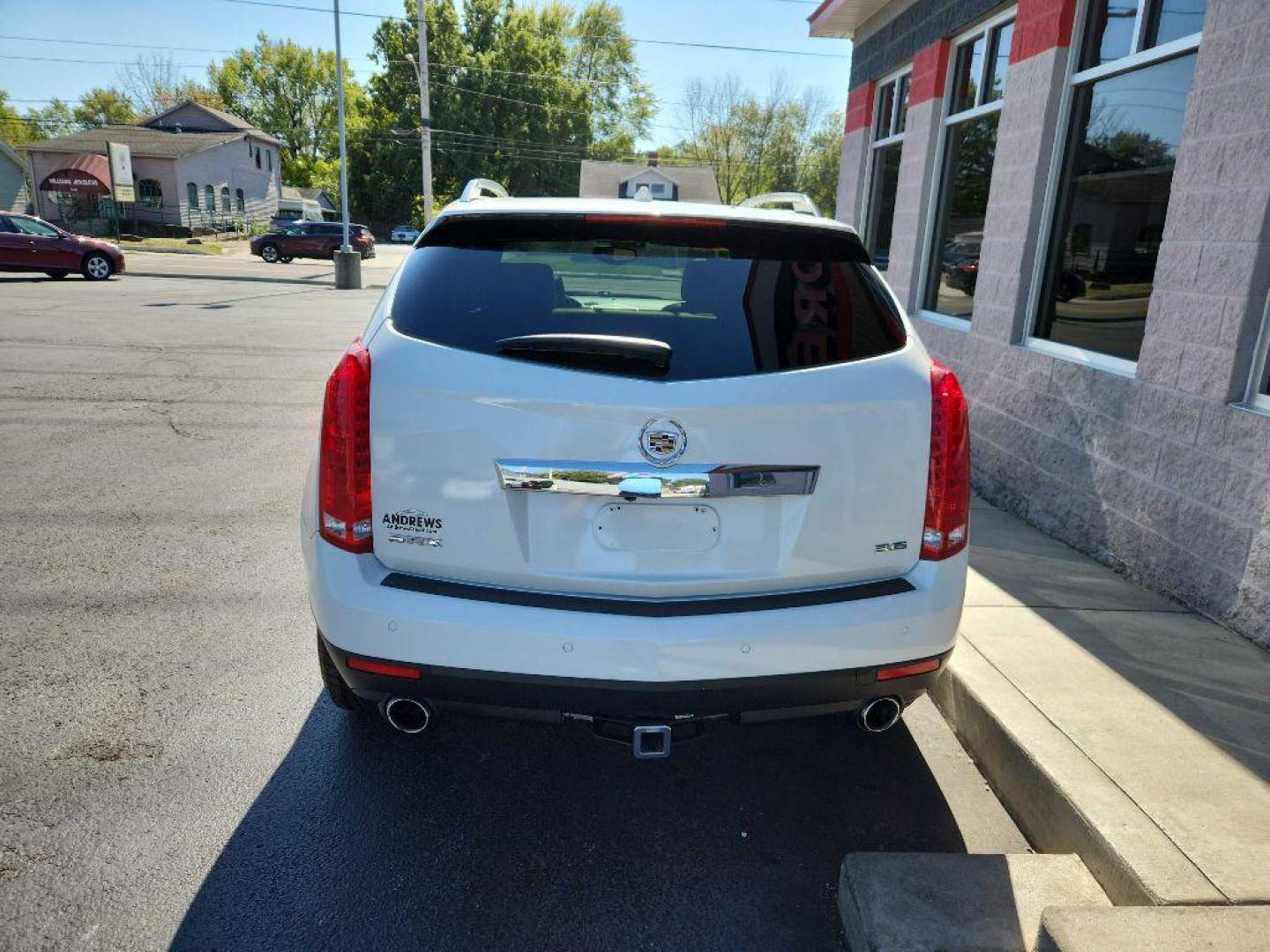 2014 WHITE CADILLAC SRX LUXURY COLLECTION (3GYFNBE32ES) with an 3.6L engine, Automatic transmission, located at 3100 Covert Avenue, Evansville, IN, 47714, (812) 473-4492, 37.955418, -87.512238 - Photo#5