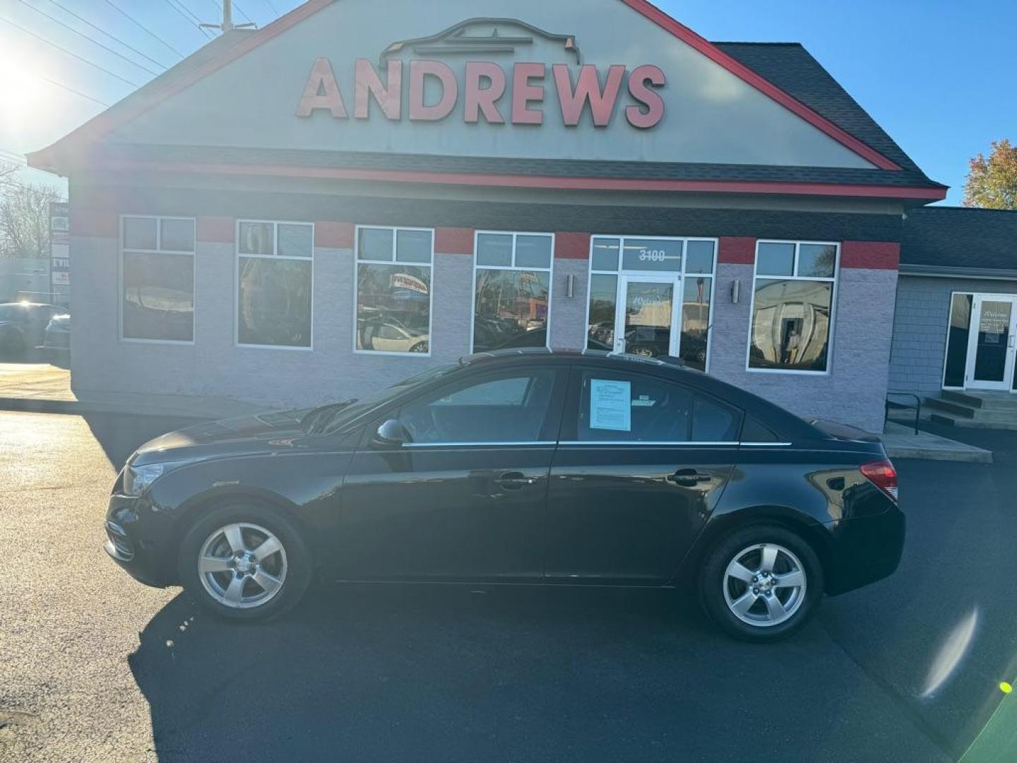 2016 BLACK CHEVROLET CRUZE LIMITED LT (1G1PE5SB0G7) with an 1.4L engine, Automatic transmission, located at 3100 Covert Avenue, Evansville, IN, 47714, (812) 473-4492, 37.955418, -87.512238 - Photo#0