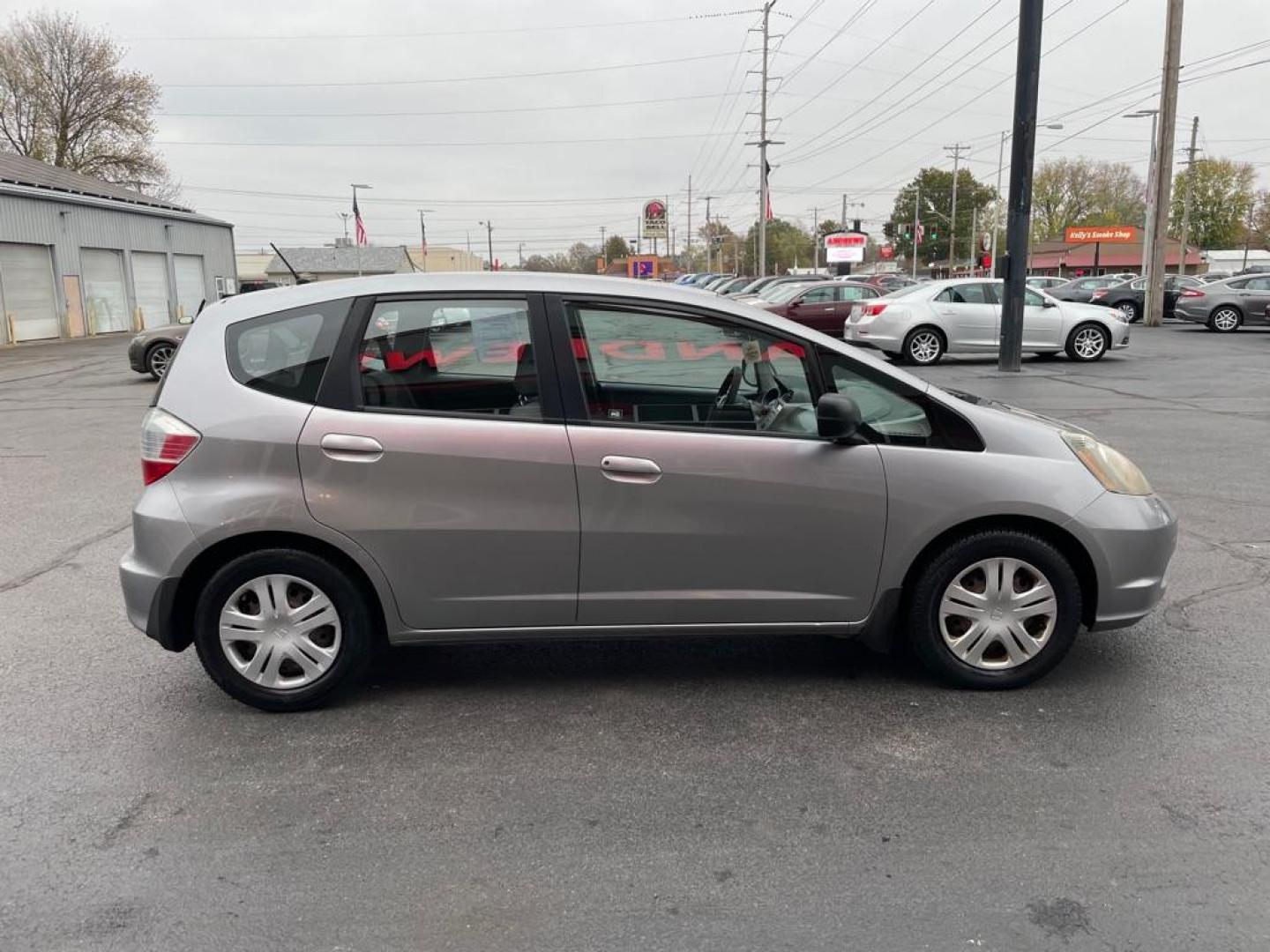 2009 GRAY HONDA FIT (JHMGE88289S) with an 1.5L engine, Automatic transmission, located at 3100 Covert Avenue, Evansville, IN, 47714, (812) 473-4492, 37.955418, -87.512238 - Photo#2