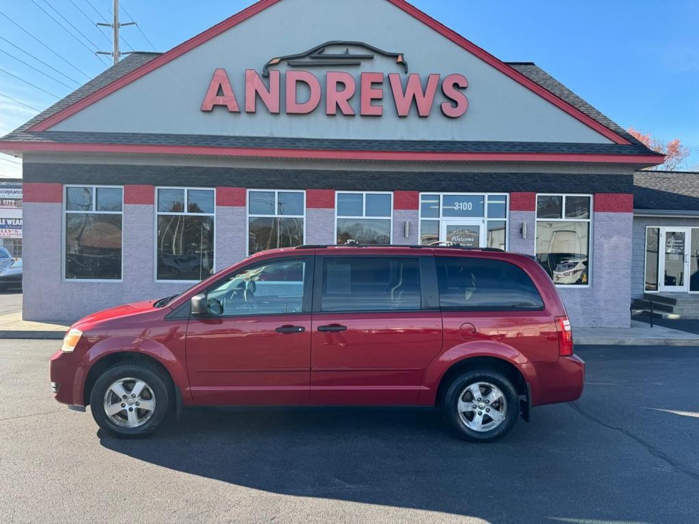 2008 RED DODGE GRAND CARAVAN SE (2D8HN44H58R) with an 3.3L engine, Automatic transmission, located at 3100 Covert Avenue, Evansville, IN, 47714, (812) 473-4492, 37.955418, -87.512238 - Photo#0