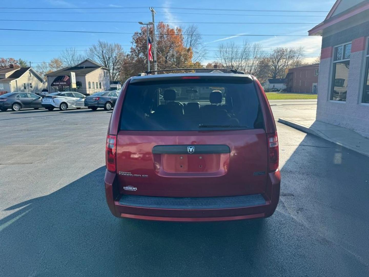 2008 RED DODGE GRAND CARAVAN SE (2D8HN44H58R) with an 3.3L engine, Automatic transmission, located at 3100 Covert Avenue, Evansville, IN, 47714, (812) 473-4492, 37.955418, -87.512238 - Photo#3