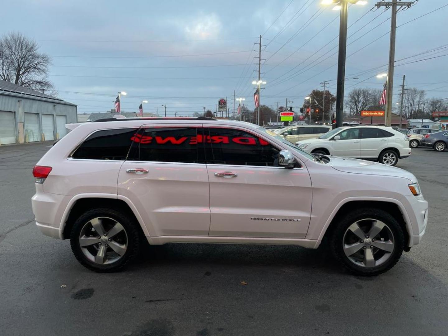 2015 WHITE JEEP GRAND CHEROKEE OVERLAND (1C4RJFCG2FC) with an 3.6L engine, Automatic transmission, located at 3100 Covert Avenue, Evansville, IN, 47714, (812) 473-4492, 37.955418, -87.512238 - Photo#2