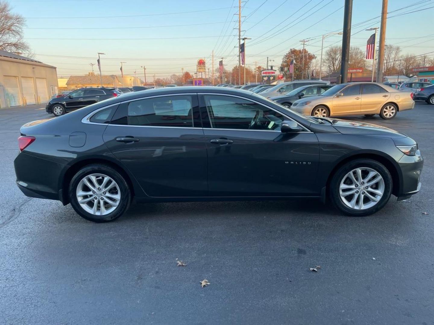 2016 GRAY CHEVROLET MALIBU LT (1G1ZE5ST6GF) with an 1.5L engine, Automatic transmission, located at 3100 Covert Avenue, Evansville, IN, 47714, (812) 473-4492, 37.955418, -87.512238 - Photo#2