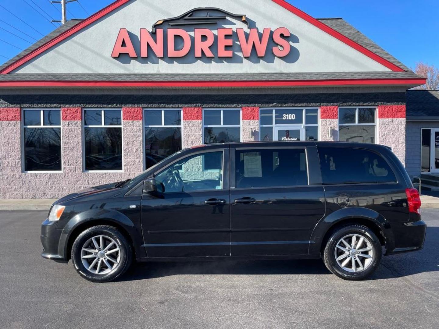 2014 BLACK DODGE GRAND CARAVAN SE (2C4RDGBG3ER) with an 3.6L engine, Automatic transmission, located at 3100 Covert Avenue, Evansville, IN, 47714, (812) 473-4492, 37.955418, -87.512238 - Photo#0