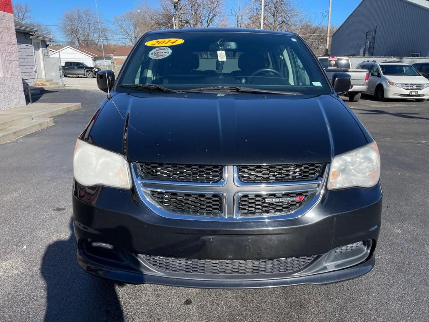 2014 BLACK DODGE GRAND CARAVAN SE (2C4RDGBG3ER) with an 3.6L engine, Automatic transmission, located at 3100 Covert Avenue, Evansville, IN, 47714, (812) 473-4492, 37.955418, -87.512238 - Photo#1