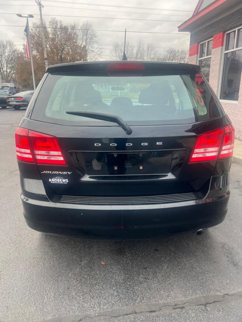 2015 BLACK DODGE JOURNEY SE (3C4PDCAB0FT) with an 2.4L engine, Automatic transmission, located at 3100 Covert Avenue, Evansville, IN, 47714, (812) 473-4492, 37.955418, -87.512238 - Photo#3