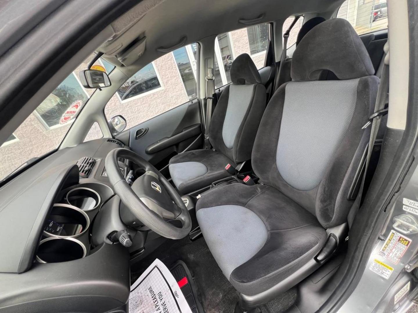 2008 GRAY HONDA FIT (JHMGD38498S) with an 1.5L engine, Automatic transmission, located at 3100 Covert Avenue, Evansville, IN, 47714, (812) 473-4492, 37.955418, -87.512238 - Photo#5