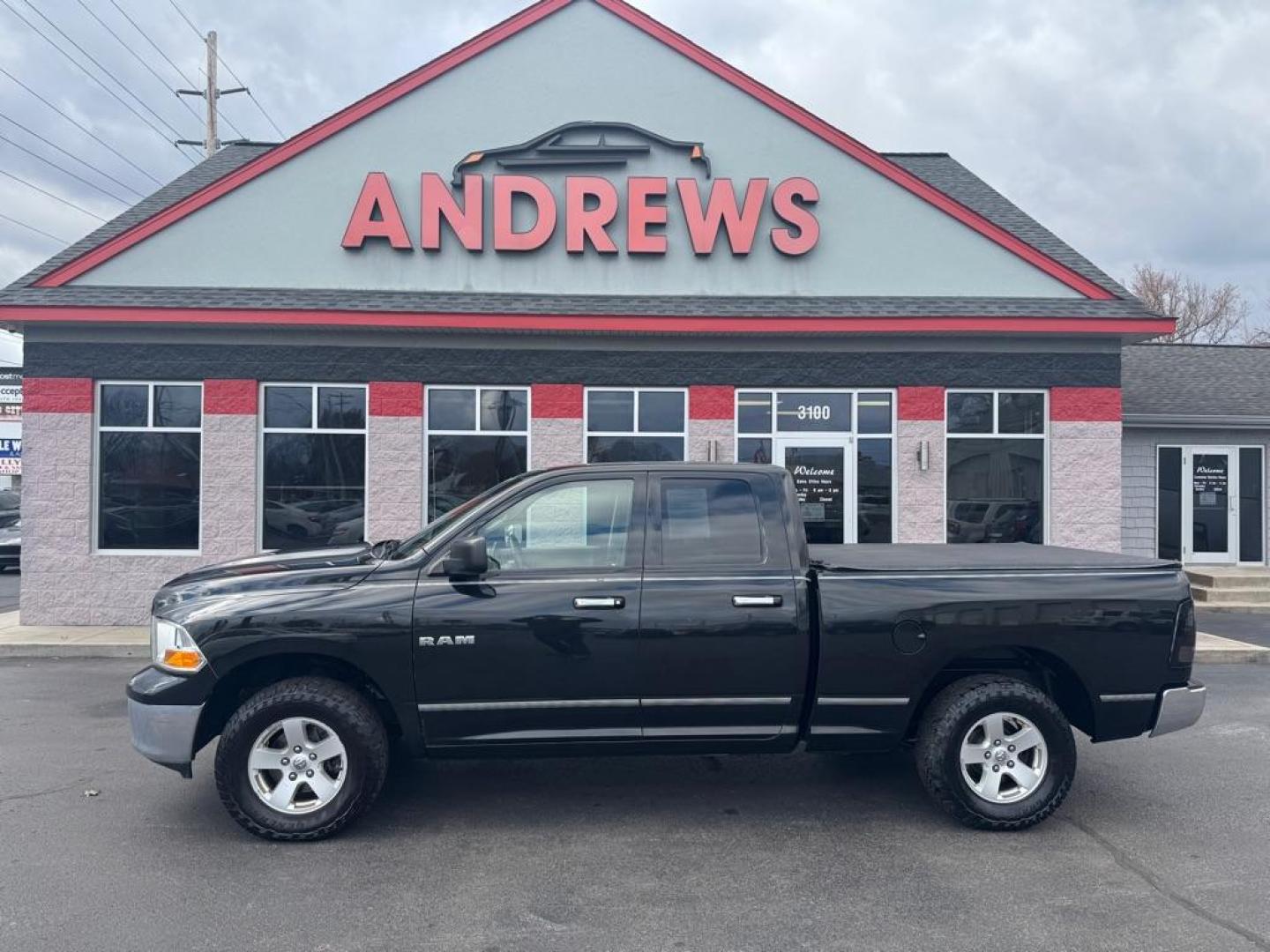 2009 BLACK DODGE RAM 1500 (1D3HV18P89S) with an 4.7L engine, Automatic transmission, located at 3100 Covert Avenue, Evansville, IN, 47714, (812) 473-4492, 37.955418, -87.512238 - Photo#0