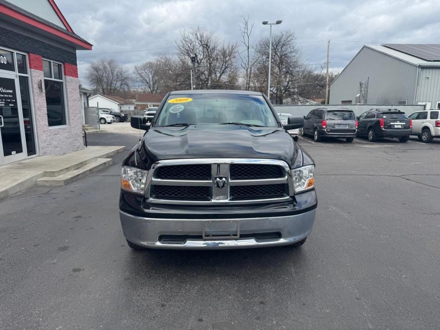 2009 BLACK DODGE RAM 1500 (1D3HV18P89S) with an 4.7L engine, Automatic transmission, located at 3100 Covert Avenue, Evansville, IN, 47714, (812) 473-4492, 37.955418, -87.512238 - Photo#1