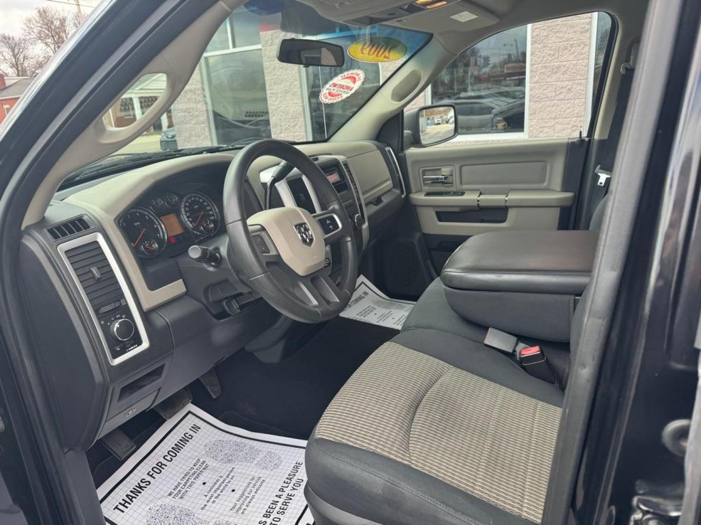 2009 BLACK DODGE RAM 1500 (1D3HV18P89S) with an 4.7L engine, Automatic transmission, located at 3100 Covert Avenue, Evansville, IN, 47714, (812) 473-4492, 37.955418, -87.512238 - Photo#4