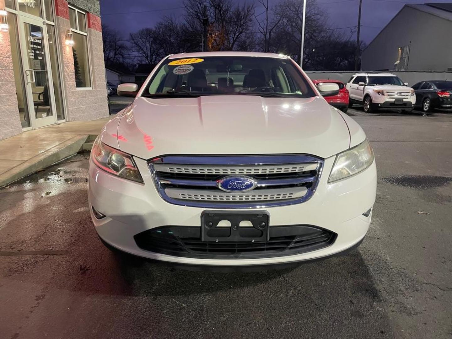 2012 WHITE FORD TAURUS SEL (1FAHP2EW9CG) with an 3.5L engine, Automatic transmission, located at 3100 Covert Avenue, Evansville, IN, 47714, (812) 473-4492, 37.955418, -87.512238 - Photo#1