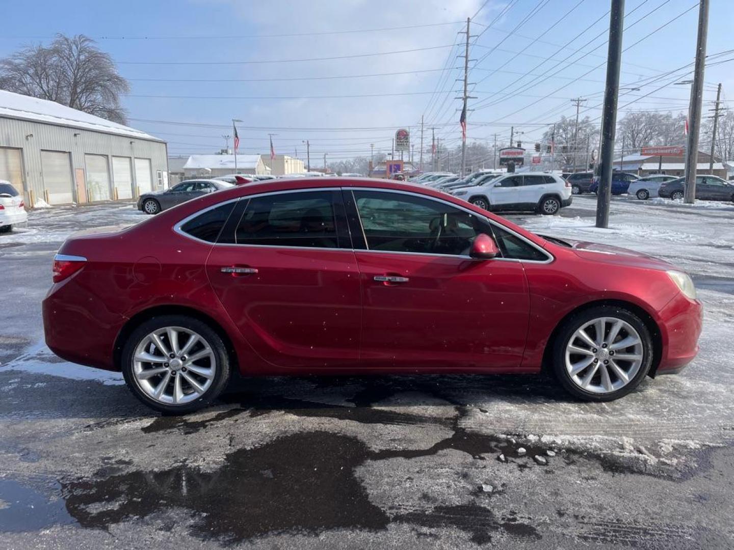 2013 RED BUICK VERANO CONVENIENCE (1G4PR5SK5D4) with an 2.4L engine, Automatic transmission, located at 3100 Covert Avenue, Evansville, IN, 47714, (812) 473-4492, 37.955418, -87.512238 - Photo#2