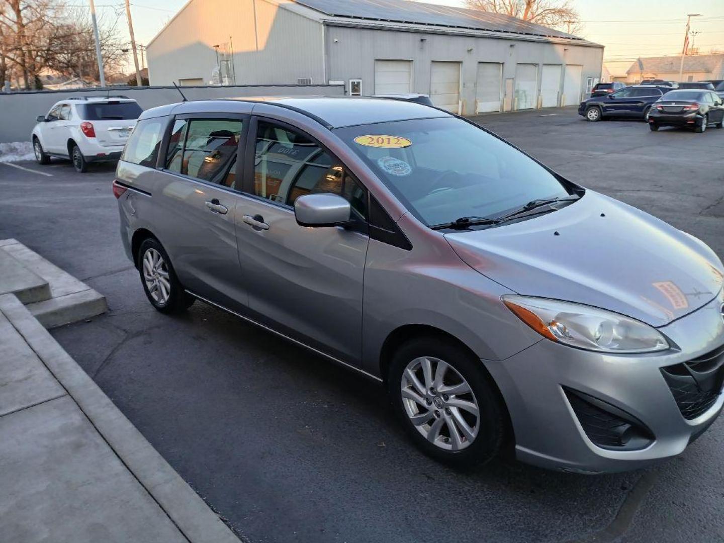 2012 SILVER MAZDA 5 (JM1CW2BL9C0) with an 2.5L engine, Automatic transmission, located at 3100 Covert Avenue, Evansville, IN, 47714, (812) 473-4492, 37.955418, -87.512238 - Photo#0